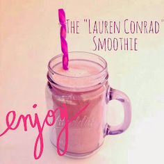 there is a pink smoothie in a mason jar