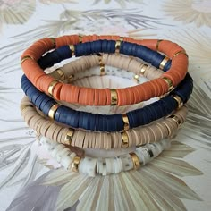 🍁 The listing is for Individual Autumn Neutral Colored bracelets. These beauties can be worn by themselves, or as a stack!  I offer a variety of sizes from xs to xxl. You can find instructions on how to easily measure your wrist! 🍁All bracelets are FINAL SALE as these are custom orders. Please double check your bracelet size for optimal comfort fit  🍁 CARE INSTRUCTIONS: - Avoid contact with water to improve longevity. -Roll bracelets onto your wrist to avoid over stretching. If you have any questions or specific requests, please feel free to reach out in my messages! I will get back to you ASAP! DONT FORGET TO TAG ME ON INSTAGRAM WITH YOUR STYLING!!  https://www.instagram.com/theruffledpebble/ Autumn Neutral Beaded Individual Bracelets, Stackable Bracelets, Beaded Bracelets, Fall Bracel Bracelets Fall, Bracelets Heishi, Heishi Jewelry, Neutral Bracelets, Stackable Beaded Bracelets, Fall Bead, Heishi Bracelet