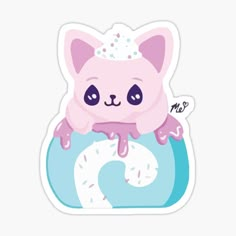 a sticker with an image of a cat on top of a donut