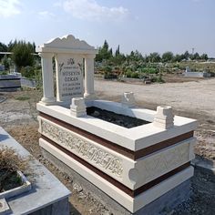 a cemetery with a monument in the middle