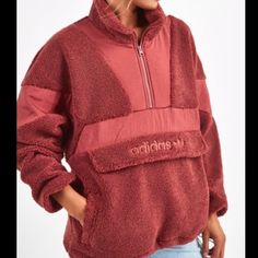 This Is Very Warm And Thick, It Is Also Very Oversized, Size Down, I Usually Wear A Medium And This Fits Me Great, Love This, It Is A Xs But I Am Going To Put Small Medium Because It Fits More Like That Cozy Tops With Pockets For Cold Weather, Adidas Casual Fall Outerwear, Adidas Long Sleeve Winter Outerwear, Sporty Red Fleece Jacket For Fall, Sporty Sherpa Fleece Jacket For Fall, Red Fleece Jacket With Fleece Lining For Winter, Red Winter Fleece Jacket With Fleece Lining, Adidas Outerwear For Cold Weather, Trendy Adidas Winter Outerwear