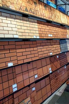 many different types of bricks are stacked on top of each other