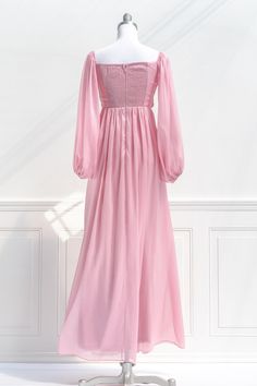 A fairytale-pink gown, the Persephone maxi dress in sparkling blush pink chiffon features a pleated bodice, long sleeves, smocked elastic back with zipper, a sweetheart neckline, and a full, sweeping skirt. Please Note- This item is final sale only. . Details: S: Bust 32"-36", Waist 26"-28", Length 58" M: Bust 34"-38", Waist 28"-30", Length 59" L: Bust 36"-40", Waist 30"-32", Length 60" Skirt Length Waist to Hem: 47" Center Back Zipper 100% Polyester Lined Dry Clean Only Imported Pink Aesthetic Retro, Simple Prom Dress, Light Pink Dress, Pink Chiffon, Pink Gowns, Pleated Bodice, Romantic Dress, French Fashion, Retro Dress