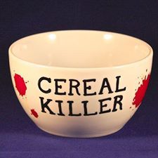 a bowl with the words cereal killer painted on it