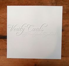 a white card with the words, very cards left in it on top of a wooden table