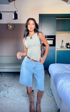 Cowboy Boots Baggy Jeans, Jorts With Knee Boots, Florida Outfits December, Cool Weather Summer Outfits, Suede Cowboy Boots Outfit, Chill Concert Outfit, Fashion Inspo Outfits 2024 Summer, Lower East Side Fashion, Jorts Outfit Women’s