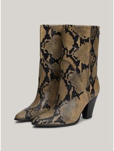 Tommy Hilfiger women's boot. Stand out from the crowd in these mid boots, featuring Western-inspired heels and snake-embossed leather uppers for extra elegance.  Material: 100% Leather (fwa). Snake Print Boots, Boot Stand, Print Boots, Mid Boots, Cowboy Boot, Tommy Hilfiger Women, Snake Print, Embossed Leather, Leather Heels