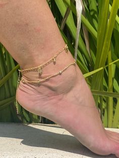 "18 Karat Gold Filled Anklet- Tarnish Resistant- Hypoallergenic Options Available Below Anklet lengths: 18 Karat Gold Filled Ball Chain Anklet length: 10\" 18 Karat Gold Filled Clover Chain Anklet length: 11.5\" Please message us if you would like to add extension chain or cut your chain to a custom size. If the item is cut it would be final sale. Material: 18 Karat Gold Filled. Gold-filled does not de-laminate or peel like Gold plated Jewelry nor does it tarnish as readily as silver. From time Gold Chain Anklet, Women Protection, Schmuck Gold, Anklet Gold, Anklets For Women, Charm Anklet, Clover Jewelry, 4 Leaf Clover, Gold Anklet