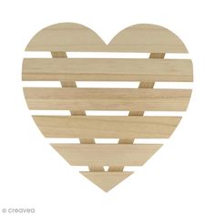 a wooden heart shaped cutout with strips of wood in the shape of a heart