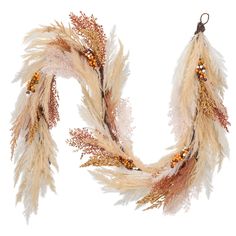 two pieces of dried grass with beads hanging from it's ends, on a white background