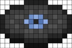 a black and white square with blue squares on it's side, in the middle is