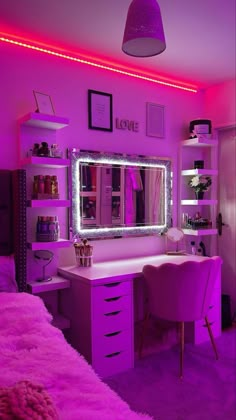 a bedroom with purple lighting and pink furniture