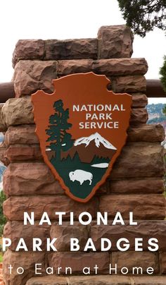 the national park badges are on top of a stone sign that reads, to earn at home