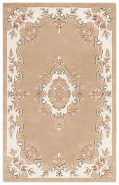 a beige rug with an ornate design on the top and bottom, in various colors