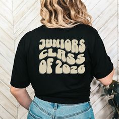 Congrats graduating Class of 2026! This is the perfect shirt to rock for your challenging years in college or high school! It will also be a great gift for your graduating loved one!  How to order: 1) Select shirt color 2) Select shirt size 3) Add to cart Shipping Time Estimated: 2-7 business days T-Shirt Specifications This classic unisex jersey short sleeve tee fits like a well-loved favorite. Soft cotton and quality print make users fall in love with it over and over again. These t-shirts hav Junior Class Shirts, Class Shirt Ideas High Schools, Class Of 2026, Gift For Graduate, Junior Shirts, High School Graduation Gifts, Class Shirt, Spirit Shirts, Senior Year