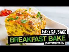 an easy sausage breakfast bake on a plate with tomatoes and ketchup in the background