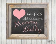 a chalkboard sign that says, weeks until we become mommy and daddy