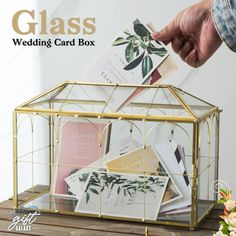 The Handmade Geometric Glass Card Box is an exquisite, one-of-a-kind creation that adds both elegance and functionality to any wedding reception or special event. 🌸✨ Carefully handcrafted with clear glass panels and framed by sleek metal in a modern, geometric design, this card box perfectly blends simplicity with sophistication. The transparent glass allows guests to see the cards inside, creating a beautiful visual display that adds a touch of charm to your event decor. 💫 Size; 🌸 Size 10.2 Glass Wedding Card Box, Gold Card Box, Glass Display Box, Wedding Keepsake Boxes, Box With Lock, Wedding Card Box, Decorative Storage Boxes, Gift Card Boxes, Geometric Terrarium