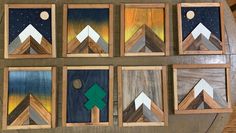 six wooden pictures with different designs on them