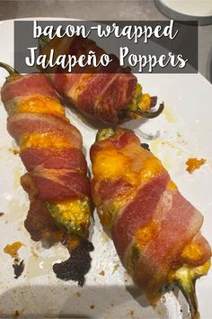 bacon wrapped jalapeno poppers on a white plate with text overlay