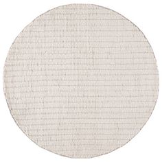 a round rug with white lines on it