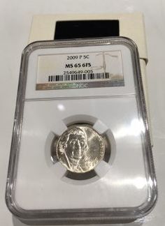 a silver coin with a barcode on the front and back of it, in a clear plastic case