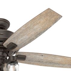 a brown ceiling fan with wooden blades and glass jars on the bottom of each blade