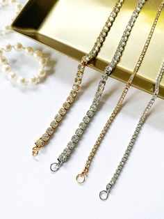 "This dainty crystal bracelet is the perfect accessory for a woman looking for an elegant touch to their wardrobe. Beautiful gift idea for a woman! 〔 𝐃 𝐞 𝐬 𝐜 𝐫 𝐢 𝐩 𝐭 𝐢 𝐨 𝐧 & 𝐒 𝐢 𝐳 𝐞 〕 Stainless steel chain in gold or silver color, clear rhinestones (2mm or 4mm/ 0.07\" or 0.15\"). Tarnish free and waterproof. ♥ Made in Europe - Riga, Latvia. ♥ Each bracelet is made to order which gives them a unique meaning! 〔 𝐏 𝐚 𝐜 𝐤 𝐚 𝐠 𝐢 𝐧 𝐠 & 𝐒 𝐡 𝐢 𝐩 𝐩 𝐢 𝐧 𝐠 〕 It takes 1 to 2 d Unique Meaning, Bracelet Cute, Fake Diamond, Bracelet Tennis, Riga Latvia, Crystal Chain, Bridal Bracelet, Rhinestone Bracelet, Silver Rhinestone