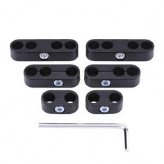 four black plastic mountings for the front and rear wheels