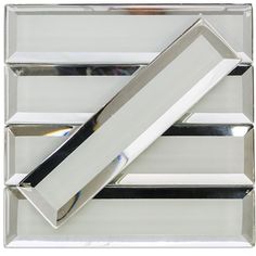 a silver rectangular object on a white background