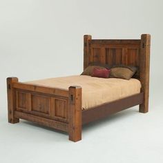 a bed with wooden headboard and foot board, made out of wood planks