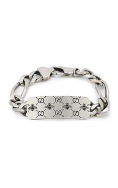 GUCCI Signature Silver Bracelet with Bee Motif YBA728264001The historical GG motif appears alongside a favorite House symbol, the bee.The contemporary feel to the design echos the gender-fluid approach that is seen throughout the collection. The two engraved emblems feature as the defining design... House Symbol, Diamond Accessories, Timeless Watches, Gender Fluid, Cushion Diamond, Square Diamond, The Bee, Oval Cut Diamond, Princess Diamond