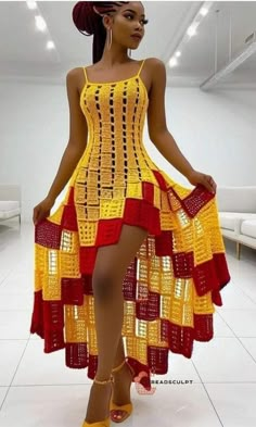 a woman in a yellow and red dress