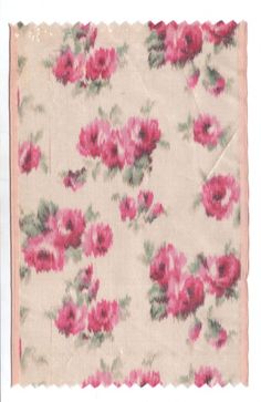 a piece of cloth with pink flowers on it