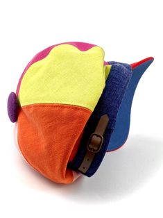 Colorful newsboy style linen and cotton cap. Inspired by the early 20th century newspaper delivery boys. It has a large visor to protect from the sun. It can be used all year. The length of the visor is 6 centimeters. The interior is made of a very light cotton lining The back of the cap has a small eco-leather belt to adjust the measurement up to three centimeters less. Cut and sewn on the bias, this cap adapts very well to the head due to its original pattern. For its production we use top qua Multicolor Cotton Hat, One Size Fits Most, Multicolor Baseball Cap With Curved Brim, Casual Multicolor Hat With Short Brim, Casual Multicolor Hat With Curved Brim, Multicolor Curved Brim Baseball Cap One Size, Multicolor Curved Brim Baseball Cap, Casual Multicolor Short Brim Hat, Adjustable Multicolor Baseball Cap With Curved Brim, Multicolor Cotton Hat With Short Brim