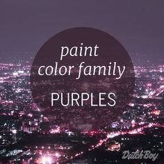 the words paint color family purples over a cityscape