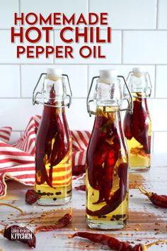 homemade hot chili pepper oil in glass bottles