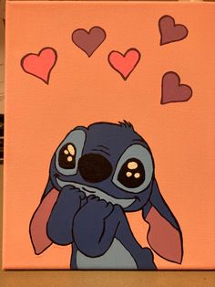 a painting of a blue rabbit with hearts floating above it on an orange background that says, i love you