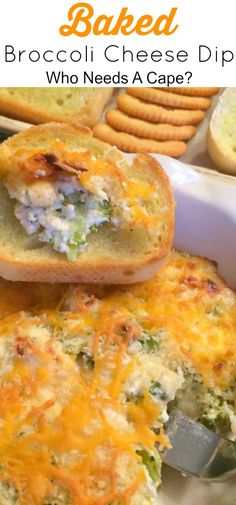 broccoli cheese dip is in a casserole dish with crackers on the side