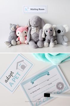 stuffed animals sitting on top of a table next to a baby's birth certificate