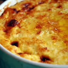 a casserole dish with cheese and other toppings