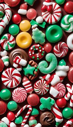 many different types of candy and candies are arranged in the shape of christmas decorations