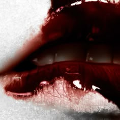 a woman's lips with blood on them