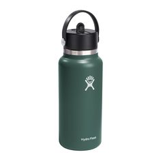 the hydro flask water bottle is green and has a black lid, with an emblem on