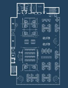 a blueprinted floor plan for an office with several tables and chairs in it