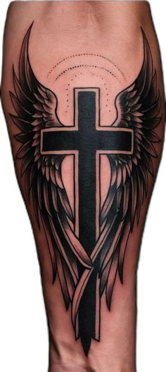 a cross and wings tattoo on the back of a man's leg is shown