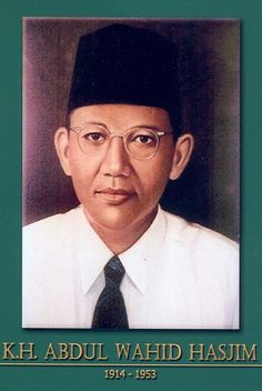 a portrait of a man wearing glasses and a black hat with the words kh abuul wahid haisim on it