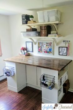 a kitchen island with shelves and baskets on top