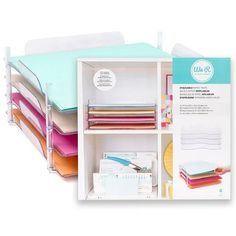 an assortment of different colored folders and sheets in a bookcase with labels on them