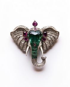 AI-Designed Elephant Pendants Elegance redefined with our AI-designed elephant brooch, adorned in radiant emeralds, rubies, and diamonds. Crafted to captivate, this statement piece merges artistry with advanced technology. Discover the future of luxury jewelry at @ochre.ai – where tradition meets innovation in high-end, sustainable designs. #AIJewelry #EmeraldBrooch #RubyJewelry #DiamondElegance #LuxuryJewelry #AIinFashion #SustainableLuxury #JewelryDesign #StatementBrooch #FineJewelry #Je... Elephant Brooch, Rubies And Diamonds, Elephant Pendant, Ruby Jewelry, Sustainable Design, Advanced Technology, Luxury Jewelry, Statement Pieces, The Future